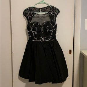 Black dress with pearl and bead embellishments